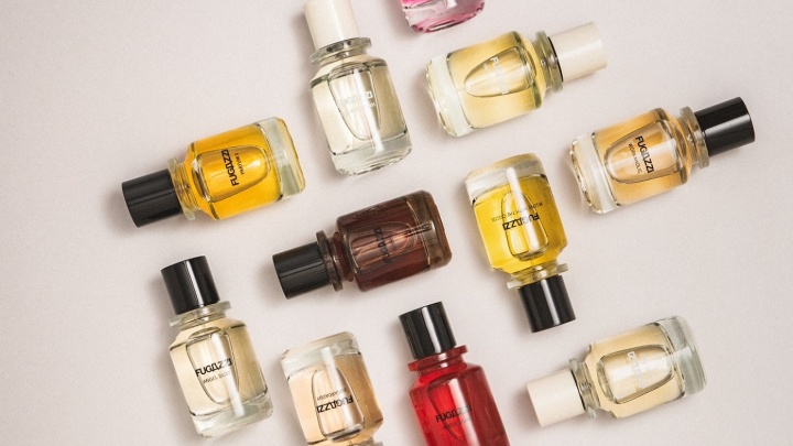 Image of FUGAZZI Perfumes with fruits around